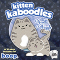 Kitten Kaboodles toy packaging with two cartoon cats on a dark blue background with paw and bone patterns.