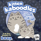 Kitten Kaboodles toy packaging with two cartoon cats on a dark blue background with paw and bone patterns.
