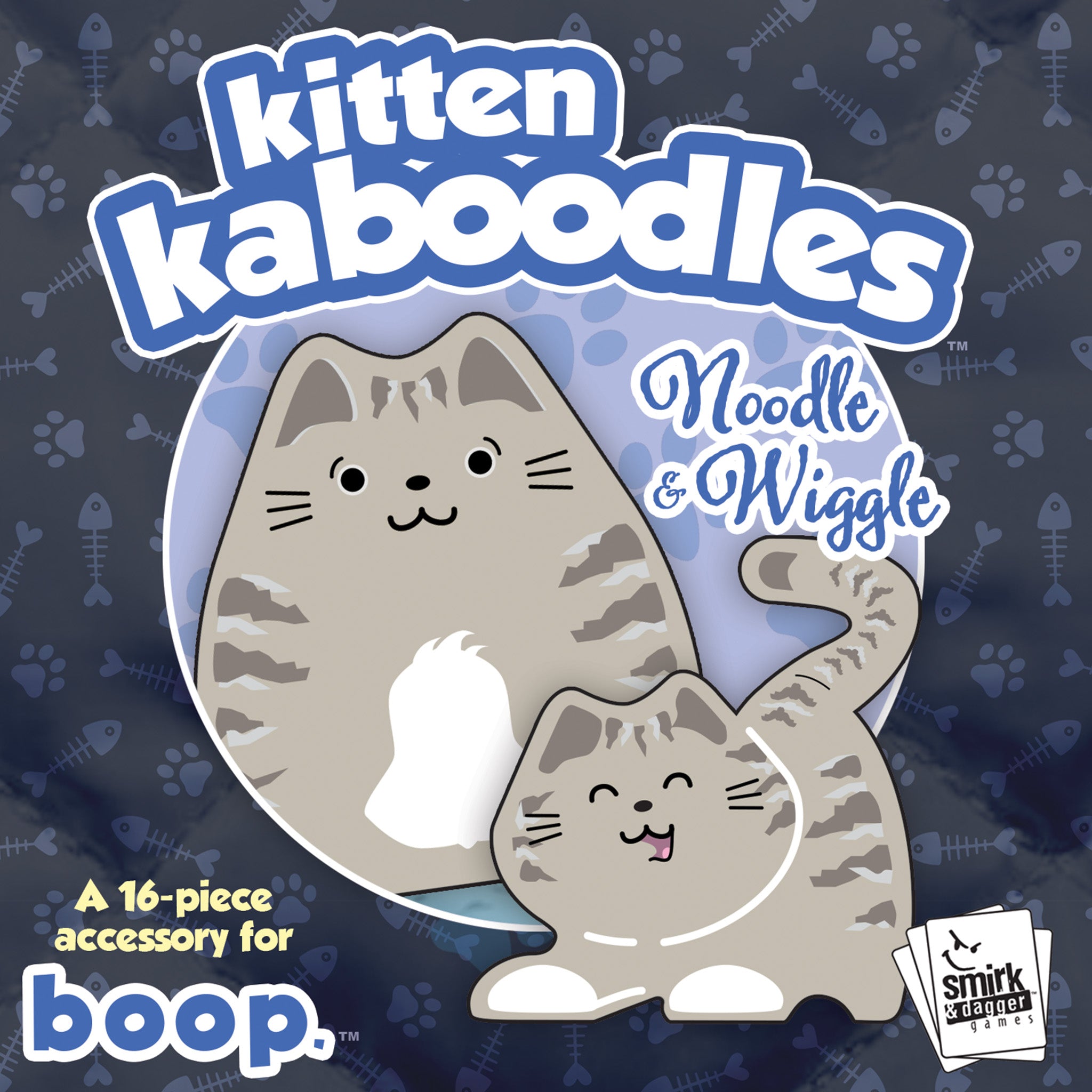 Kitten Kaboodles toy packaging with two cartoon cats on a dark blue background with paw and bone patterns.