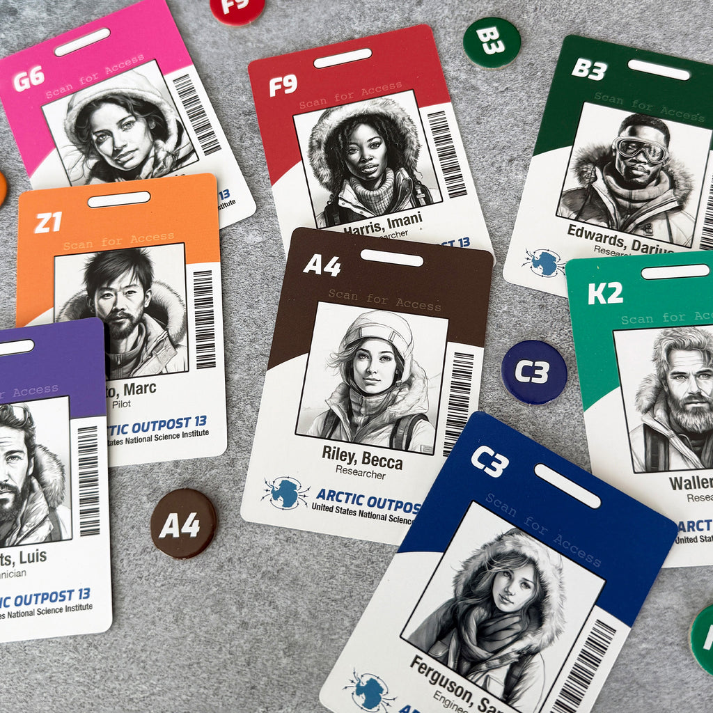 Collection of ID cards with varying designs and colors on a gray surface.