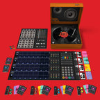 Collection of electronic music production equipment on a red background