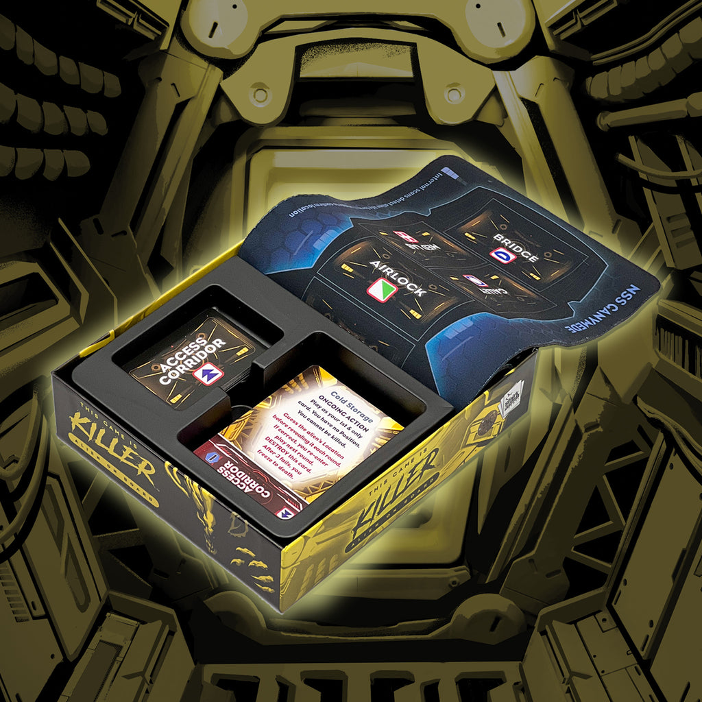Card game box with cards inside, set against a mechanical background