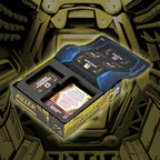 Card game box with cards inside, set against a mechanical background