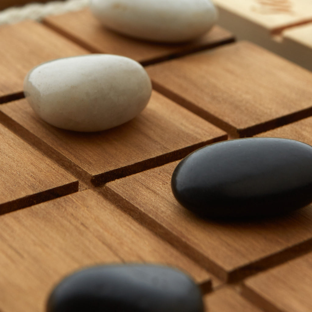 Close-up of stones on a wooden surface