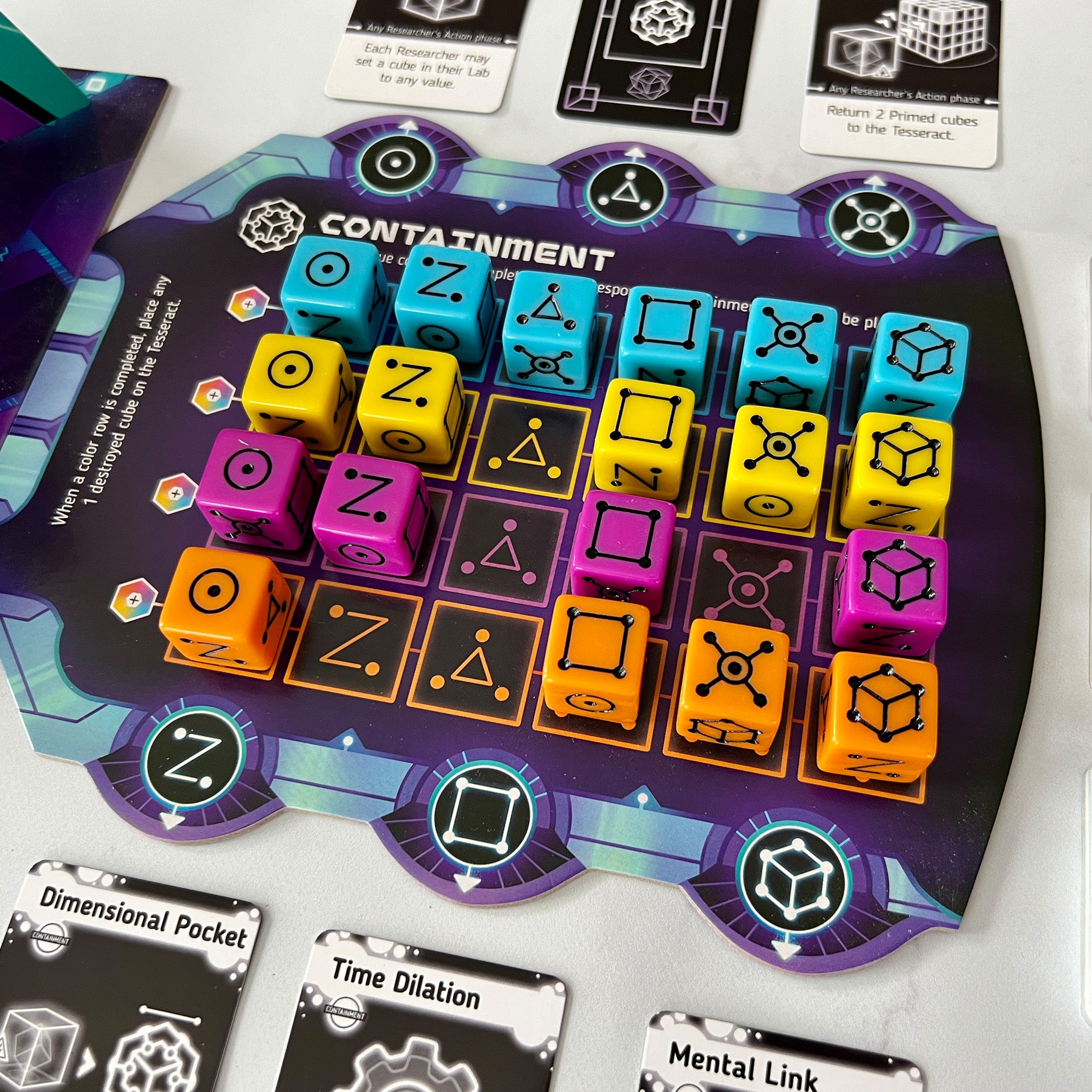 Board game component with dice and cards on a white surface